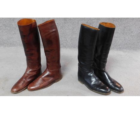 Two pairs of vintage leather riding boots, both size 10. 
