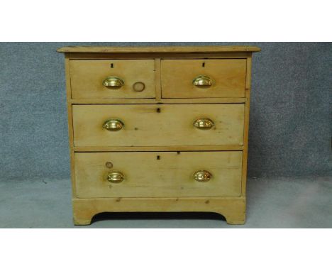 A 19th century pine chest of two short over two long drawers on bracket feet. H.83 W.87 D.48cm 