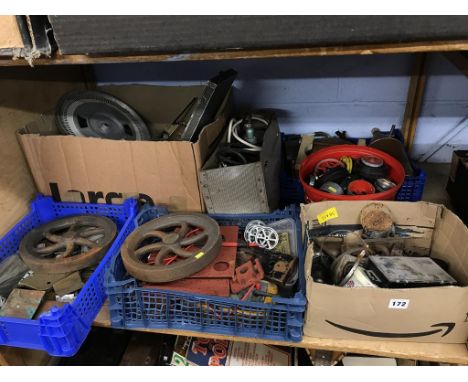 A shelf of assorted, to include model engine parts etc.