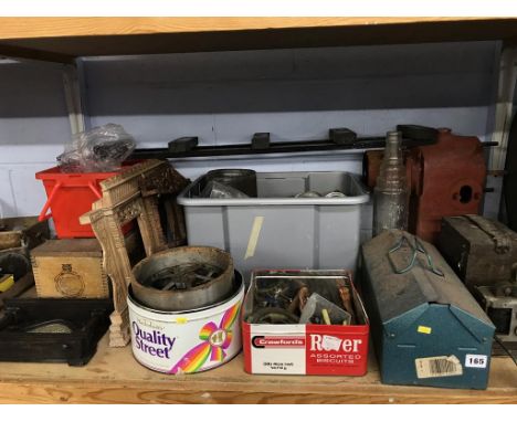 A shelf of assorted, to include an oil bottle and tools etc.