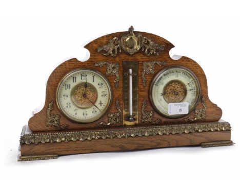 VICTORIAN OAK CLOCK BAROMETERcontained within a side-by-side architectural case with gilt brass scroll mounts, with side-by-s