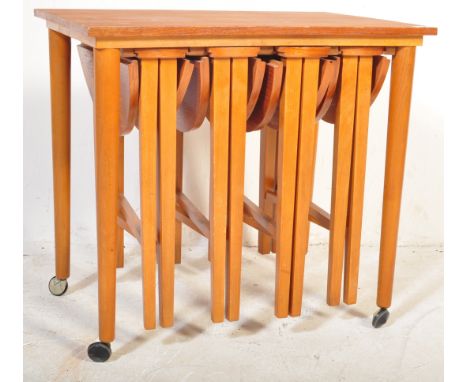 Poul Hundevad - A set of retro vintage 20th Century Czech teak wood nesting tables. The nest of tables comprising one large c