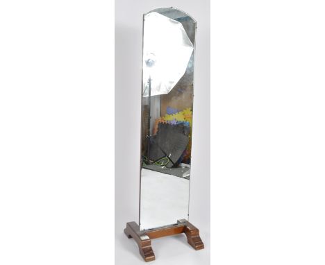 A vintage 20th Century Art Deco frameless full length cheval mirror having a arched top and oak back with all raised on trest