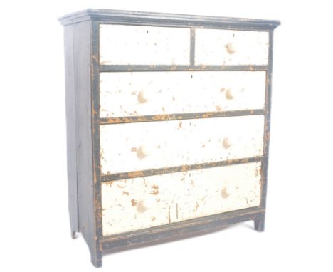 A vintage early 20th Century painted pine two over three chest of drawers finished in two tone black and white. Knob handles 