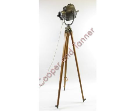 A Strand Electric light on tripod base, first half of the 20th century