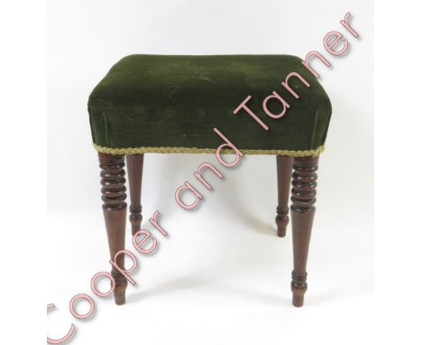 A piano stool, raised on mahogany turned legs, 44cm high