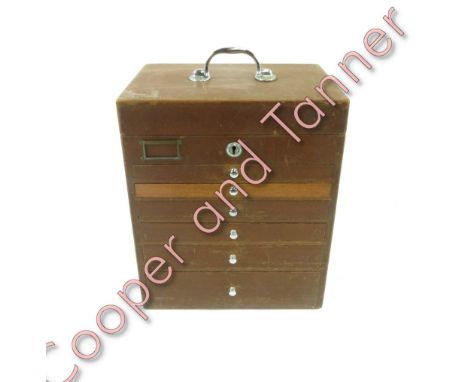 A vintage dentist/medical table top chest of drawers, set with six drawers