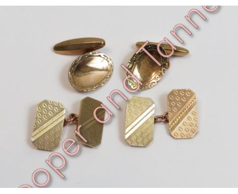 A pair of 9 carat gold cufflinks, the concave oval panels with engraved border, chain link to a torpedo shaped back panel; wi