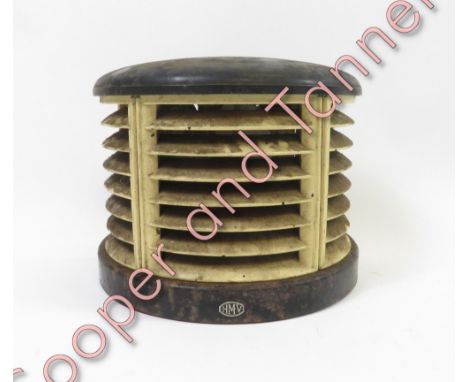 A vintage 'HMV' heater, encased in black and cream plastic