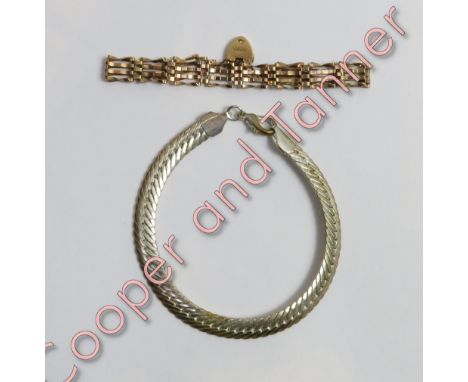 A 9 carat gold bracelet, of four bar gate links, to a padlock clasp, 4.6 g gross; with a white metal bracelet
