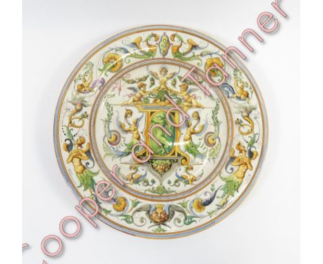 An Italian ceramic platter, highly decorated mythological characters and fauna, on a white ground, 50cm diameter