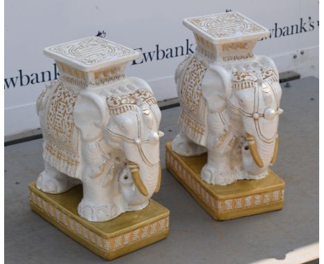 Pair of ceramic elephant form jardinière stands.    