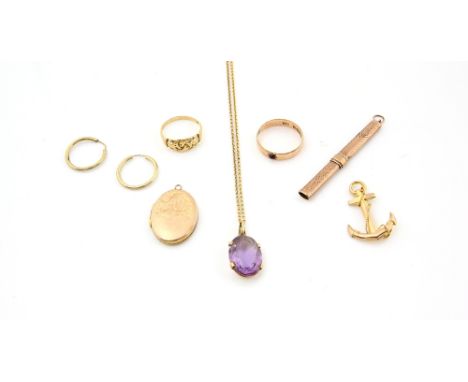 A group of gold jewellery, gold knot ring, 18 ct, other items in 9 ct including a locket, hoop earrings, ring, and an amethys