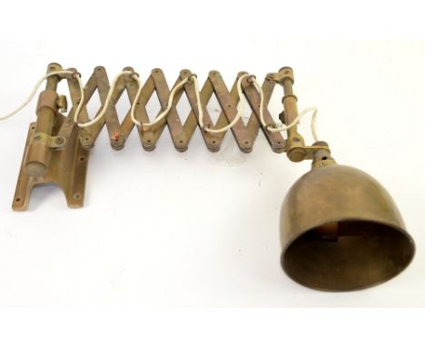 Brass extendable wall mount light fitting .    
