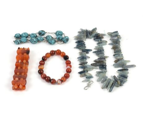 A necklace of amethyst beads, carnelian other hardstone and freshwater pearl items .    