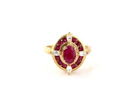 Synthetic ruby cluster ring, with compass set marquise cut synthetic white sapphires and a border of round cut rubies, mount 