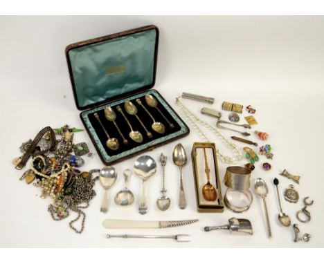 A group of silver and costume jewellery including a cased silver spoon set with thistle finials, caddy and figural spoons, mo