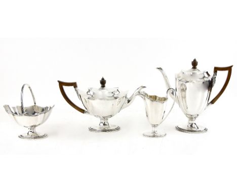 George V matched silver tea service, comprising tea pot, hot water jug, cream jug and sugar bowl, tea pot and hot water jug b