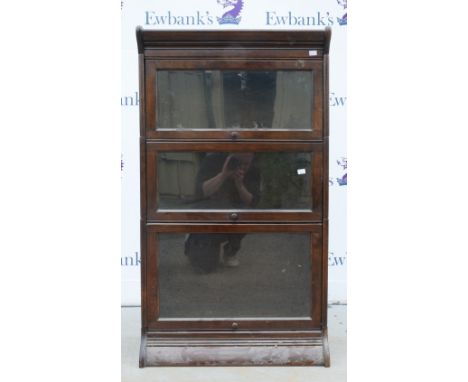 Early 20th century oak and glazed three-tier Globe Wernicke style sectional bookcase..    