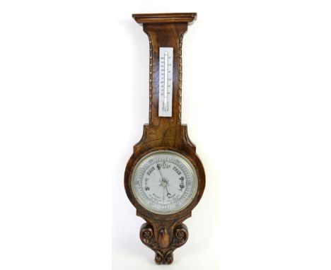 Oak cased banjo barometer .    