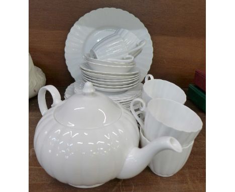 A Susie Cooper white tea service, twenty-seven pieces in total