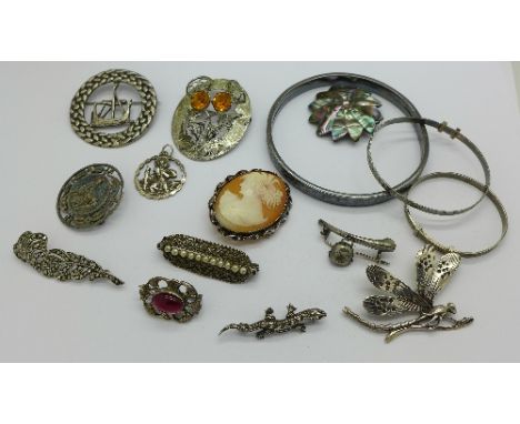 Silver brooches, three silver bangles and a St. Christopher