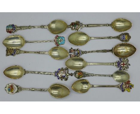 Silver and enamel souvenir spoons, 174g