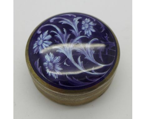 A silver and enamel pill box, diameter 39mm