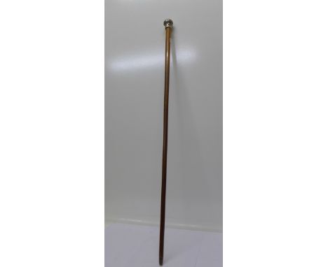 A silver topped walking cane