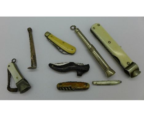 A silver cigar spiker, one other cigar spiker, two cigar cutters, a small novelty knife in the form of a shoe and three other