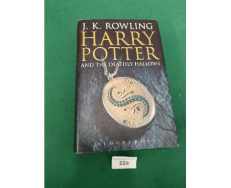 First edition j k Rowling Harry Potter and the deathly hallows book. 