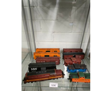 Boston and Maine 1550 train model together with rolling carriages. 