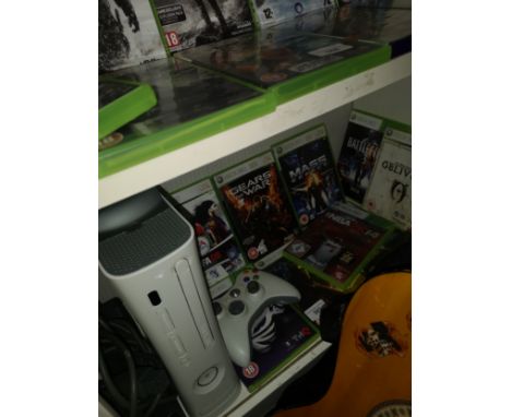 Xbox 360 console games and controller etc . 
