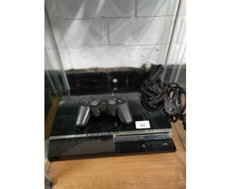 Playstation 3 console with controller and power supply. 