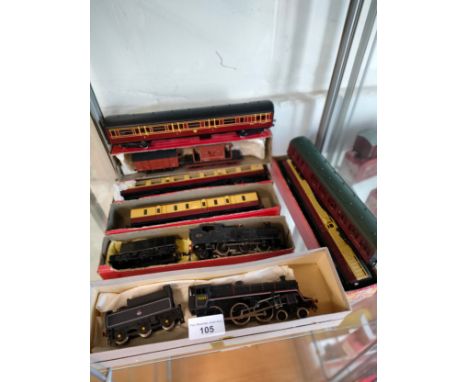 Shelf of 00 gauge loco and tender s parcial boxed together with coaches etc .