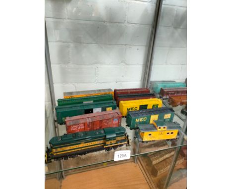 Canadian Maine central 568 train model together with rolling carriages. 