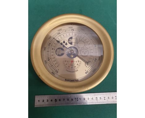 Heavy ornate brass Barometer thermometer. 