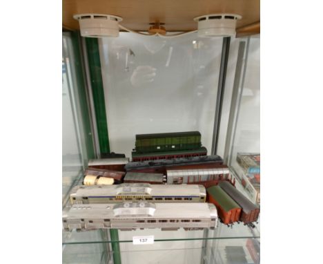 Shelf of Boston and Maine train vehicles together with rolling carriages etc . 