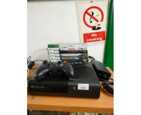 Xbox 360 console with games and power supply. 