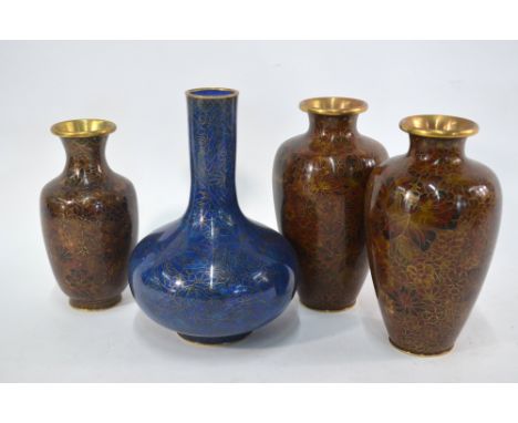 A pair of Chinese cloisonne enamel vases, each one decorated with floral designs and turquoise enamel bases; 23cm high; toget