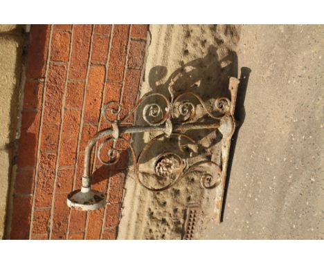 Victorian wrought iron light bracket with floral design