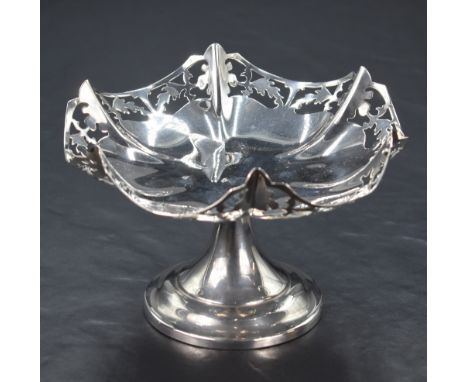 A George VI silver pedestal bon bon dish, having a lobed floral design pieced rim, raised on a circular step moulded foot, ma