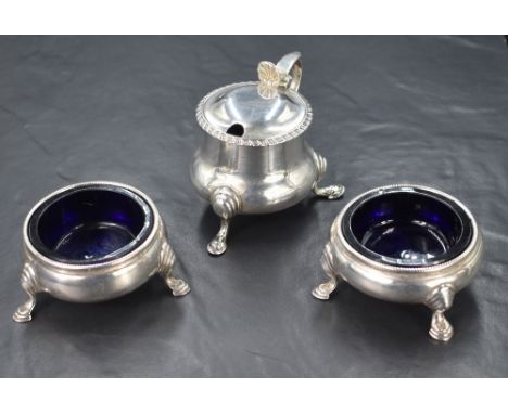 A pair of Victorian silver salts, of traditional form having bead style rims, raised on three cabriole style legs with blue g