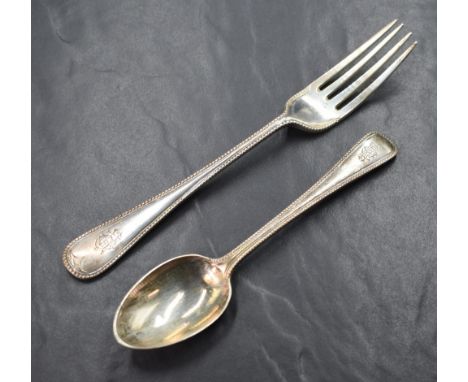 A Victorian oak canteen, of hinged rectangular form with brass carrying handles to each side, opening to reveal a silver twel
