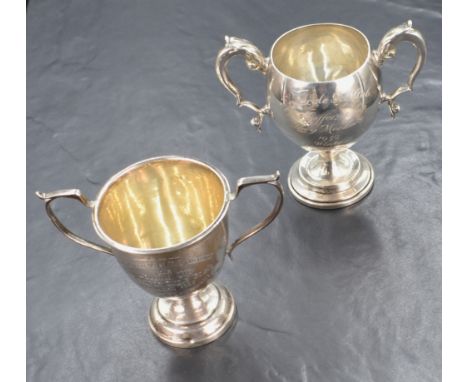 A George V silver trophy, of traditional form having c-curve handles, engraved 'Radcliffe YMCA Replica The Lomax Cup Gentleme