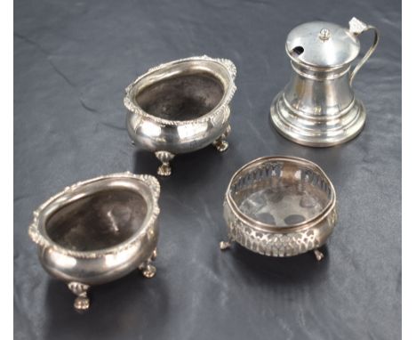 A pair of early 20th century silver salts, of oval form having gadrooned and shell style rims, raised on four claw style legs