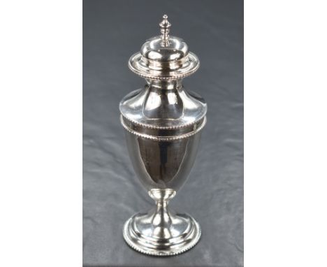 Am Edwardian silver sugar caster, of fluted form having minimal finial with bead thread to rim, with further moulded bead thr