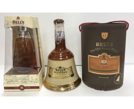 A collection of Bells Old Scotch Whisky including one bottle Millenium Water of Life 2000 8 Year Old, boxed, one porcelain de