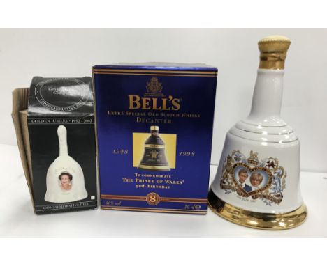 A collection of eleven Bells Old Scotch Whisky royal commemorative decanter bottles including HRH Prince Charles and Lady Dia