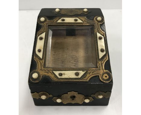 A Victorian black lacquered papier-mâché and mother of pearl inlaid and gilt decorated desk top stationery box with peacock o